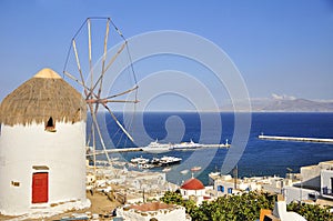 Windmill on the background of Chora Mykonos