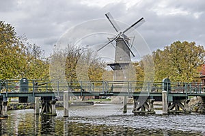 Windmill, bridge and canal