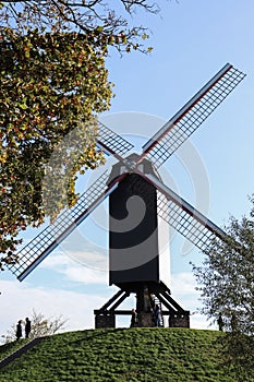 Windmill in bruges belgium photo