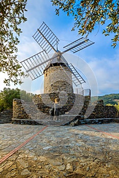 Windmill of Collioure with mornong lights in France