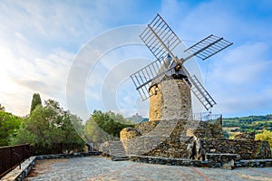 Windmill of Collioure with mornong lights in France