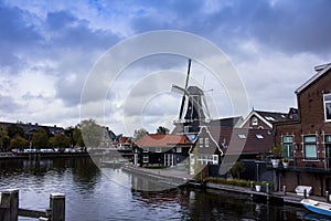 Windmill De Adriaan in Haarlem in a cloudy day, Netherlands