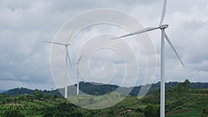 Windmill for electric power production with beautiful landscapes and blue skies