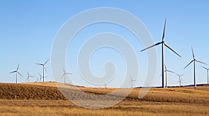 A windmill farm on a rual landscape