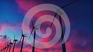 Windmill farm at sunset. Silhouette of a Windmill against a red sky. 3D Rendering