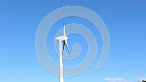 Windmill farm or wind park, with high wind turbines for generation electricity