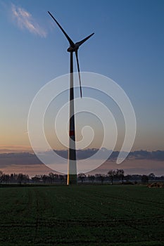 Windmill in the fields of Holland
