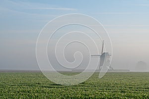 An Windmill in the fog