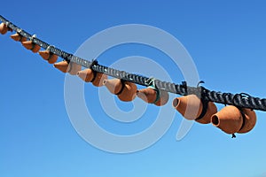 Windmill fragment on the blue sky background. Authentic Portugal. Freedom. Wonderful. Happens. Moinho ceramic Vento wind