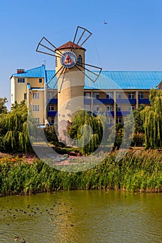 Windmill of Health on the shore of Khorol river in wellness resort Myrhorod, Ukraine.