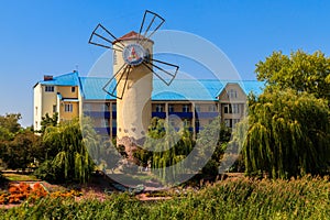 Windmill of Health on the shore of Khorol river in wellness resort Myrhorod, Ukraine