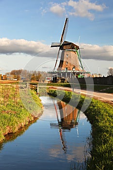 Windmill in Holland with canal