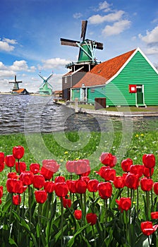 Windmill in Holland with canal