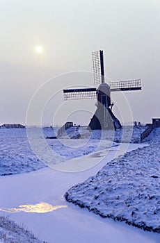 Windmill in Holland in the snow