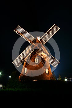 Windmill illuminated at Night.