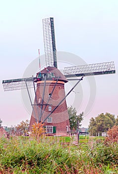 Windmill in Kinderdijk in vertical