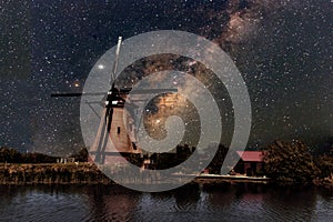 A Windmill and the milky way photo