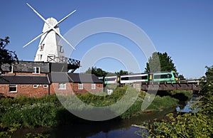 Windmill mill river england train