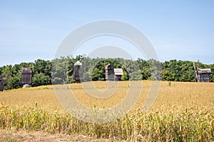 Windmill mill at rural outdoor. Iconic silhouette. Wind mill. Windmill in a rural area. Wind Farm. Dutch windmill. Landscape with