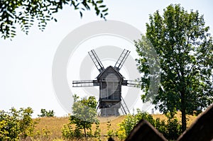 Windmill mill at rural outdoor. Wind mill. Windmill in a rural area. Wind Farm. Dutch windmill. Landscape with traditional