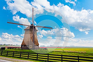 Windmill in Molendjik Neterlands with meadow