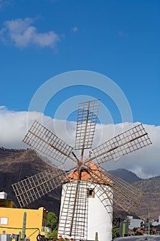 Windmill near the city of Mogan photo