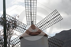 Windmill near the city of Mogan photo
