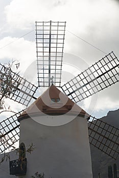 Windmill near the city of Mogan photo