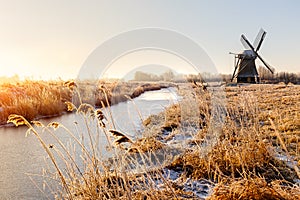 Windmill near Sande at cold winter morning photo