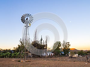 Windmill next to a farm, Khomas Highlands, Namibia.