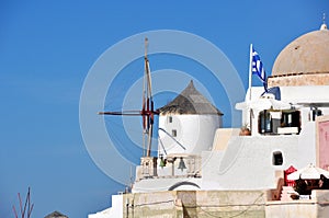 Windmill in Oia in the island of Santorini. Greece