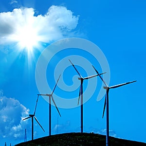 windmill over blue sky