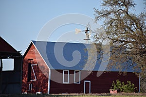 Windmill over an Old Barn in Turnersville Texas