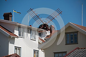 Windmill over rooftops