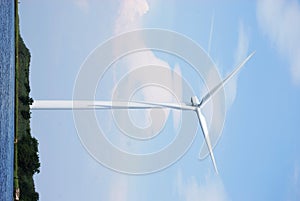 Windmill overlooking water