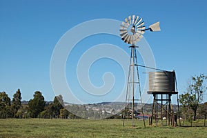 Windmill in paddock photo