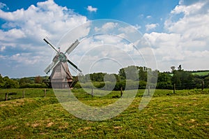Windmill in a rural landscape