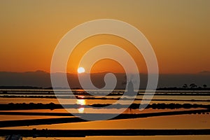 Windmill in a Sicilian saline photo