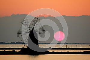 Windmill in a Sicilian saline photo