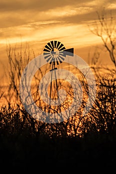 Windmill silhouette in southwest Texas sunset