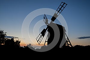 A windmill at sunset