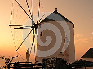 Windmill at sunset on the island of Santorini