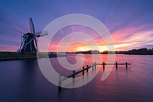 Windmill sunset at the lake