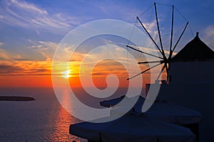 Windmill at sunset in Santorini, Greece