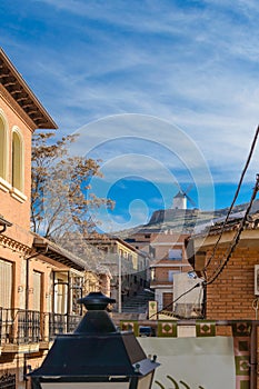 Windmill On Top Of Cerro Calderico Seen From The Town In Consuegra. December 26, 2018. Consuegra Toledo Castilla La Mancha Spain photo