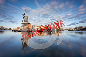 Windmill and traditional houses, Haarlem, Holland