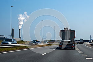 windmill truck highway road Europe Netherlands urban traffic smoke pollution