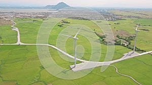 Windmill turbine on wind energy station aerial view. Alternative natural source and ecology conservation. Wind power