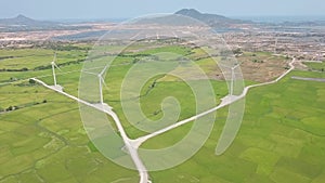 Windmill turbine on wind energy station. Alternative natural source and ecology conservation. Wind farm aerial landscape