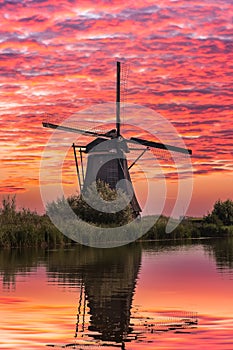 Windmill under a bloodred sky